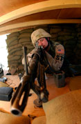 image of moon Airman mans an M-60 machine gun.