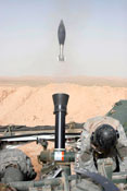 A mortar is fired from a Stryker vehicle.