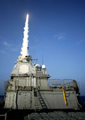 image of moon USS Lake Erie launches a Standard Missile 3.