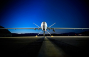 An MQ-9 Reaper sits on the flightline.