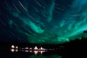 image of moon Aurora and star trails