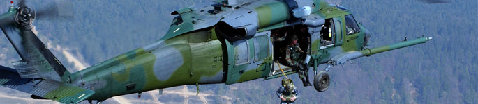 Soldier jumps from an HH-60G Pave Hawk.