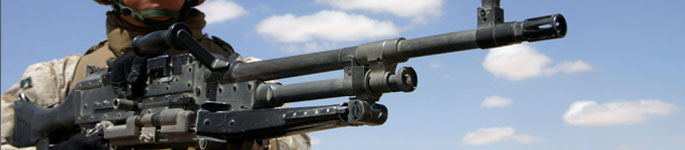 Machine gunner provides security for fellow Marines.