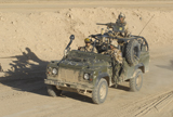 ACH100177M
Gurkhas patrol Afghanistan in a Land Rover.
