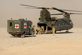 ACH100187M
A CH-47 Chinook helicopter drops of injured troops to an ambulance.
