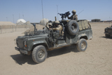 ACH100189M
British soldiers in their Land Rover at Camp Bastion, Afghanistan.