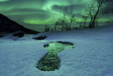 AHE100081S
Aurora Borealis over a frozen river, Norway.