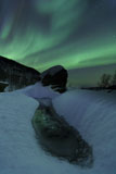 AHE100082S
Aurora Borealis over a frozen river, Norway.
