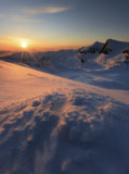 AHE100104S
Midnight Sun above Lilletinden Mountain, Nordland, Norway.