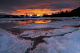 AHE100110S
A fiery sunrise over Lavangsfjord, Troms, Norway.