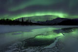 AHE100121S
Reflected aurora over a frozen Laksa Lake, Nordland, Norway.
