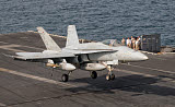 GCA100214M
An F/A-18C Hornet trap landing aboard USS George H.W. Bush.