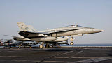 GCA100224M
An F/A-18C Hornet trap landing aboard USS George H.W. Bush.