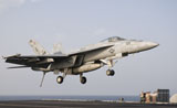 GCA100227M
An F/A-18E Super Hornet trap landing aboard USS George H.W. Bush.