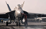 GCA100244M
An F/-18E Super Hornet is guided into catapult aboard USS George H.W. Bush.