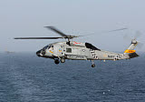 GKR100209M
A SH-60J Seahawk during a vertical replenishment in the Arabian Sea.