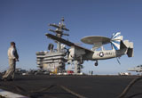 GKR100218M
An E-2C Hawkeye makes an arrested landing aboard USS Dwight D. Eisenhower.