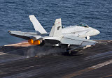 GKR100223M
An F/A-18C Hornet taking off from the flight deck of USS Dwight D. Eisenhower.