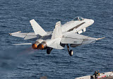 GKR100224M
An F/A-18C Hornet taking off during flight operations on USS Dwight D. Eisenhower.
