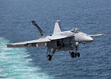 GKR100228M
An F/A-18F Super Hornet takes off during flight operations in the Arabian Sea.