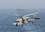 GKR100244M
A MH-60S Knighthawk conducts a vertical replenishment at sea.