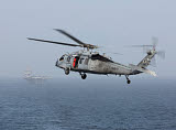 GKR100246M
A MH-60S Knighthawk conducts a vertical replenishment at sea.