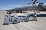 HGP100004M
Weapons crew prepare to load an AIM-120 missile on an F-15 Eagle.