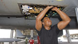HGP100067M
A crew chief performs work on an F-15 Eagle.