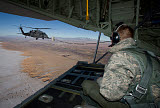 HGP100138M
A loadmaster on an HC-130 watches as an HH-60G Pave Hawk refuels.