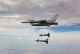 HGP100140M
An F-16 Fighting Falcon releases two GBU-24 laser guided bombs.