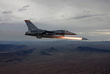HGP100148M
An F-16 Fighting Falcon fires an AGM-65 Maverick missile.