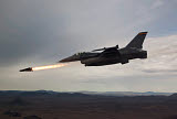 HGP100149M
An F-16 Fighting Falcon fires an AGM-65 Maverick missile.