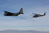 HGP100185M
An HH-60G Pave Hawk prepares  for aerial refueling from an HC-130.