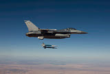 HGP100213M
An F-16 Fighting Falcon releases two GBU-12 laser guided bombs.
