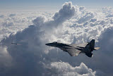 HGP100242M
An F-15 Eagle fires an AIM-9X missile.
