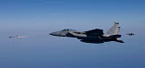 HGP100284M
An F-15 Eagle fires an AIM-9 missile.