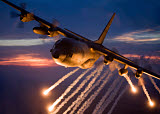 HGP100325M
A C-130 Hercules releases flares during a mission over Kansas.