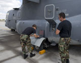 HGP100353M
Maintenance personel work on a CV-22 Osprey.