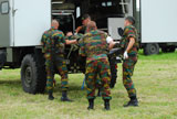 JAE100166M
Soldiers of a Belgian Infantry unit helping out a wounded colleague on the field.