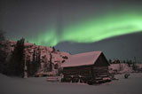 JHE100032S
Aurora borealis over a cabin, Northwest Territories, Canada.