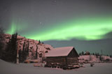 JHE100034S
Aurora borealis over a cabin, Northwest Territories, Canada.