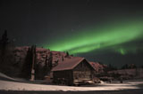 JHE100036S
Aurora borealis over a cabin, Northwest Territories, Canada.