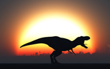 MAS100231P
A T. Rex silhouetted against the setting Sun at the end of a prehistoric day.
