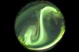 PHA100029S
Fisheye lens view of a bright aurora borealis, Yukon, Canada.