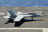 RGU100066M
An F/A-18 Hornet of the U.S. Navy landing aboard USS Eisenhower.
