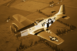 SGR100030M
A North American P-51D Mustang in flight.