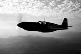 SGR100043M
A P-51A Mustang in flight.