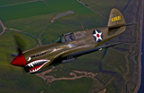 SGR100069M
A P-40E Warhawk in flight.