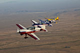 SGR100101M
Extra 300 aerobatic aircraft fly in formation over Mesa, Arizona.