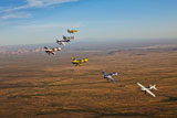 SGR100103M
Extra 300 aerobatic aircraft fly in formation over Mesa, Arizona.